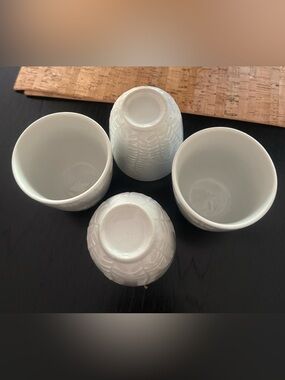 Ceramic white tea cups with flower and leaf embossed motifs BNWOB